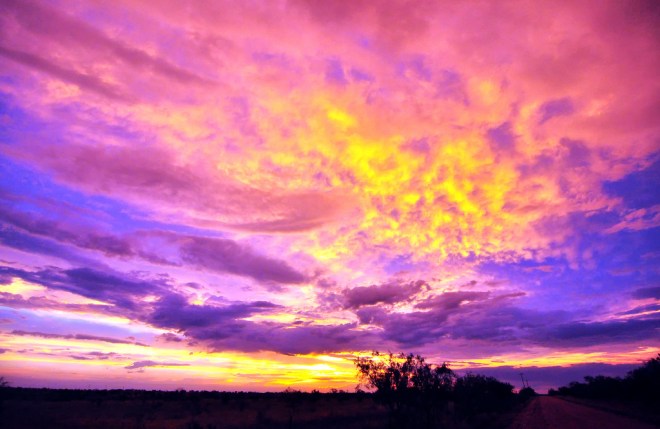 Sunset with purple, pink, gold, and blue