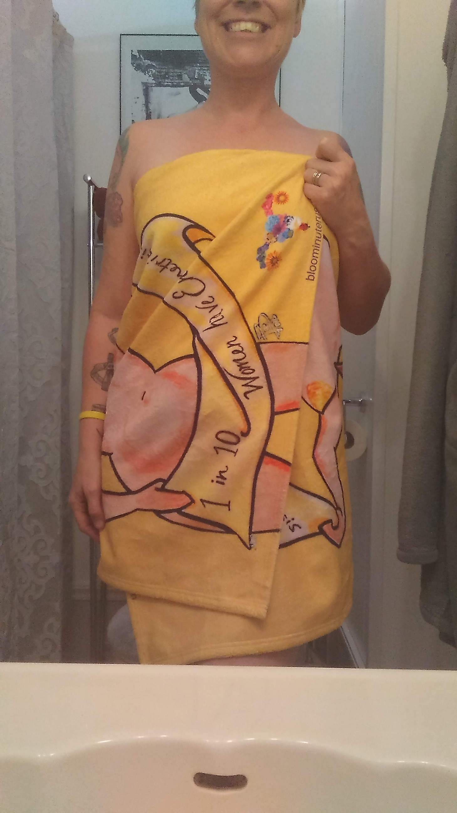 Another view of the Bloomin' Uterus Endometriosis awareness beach towel