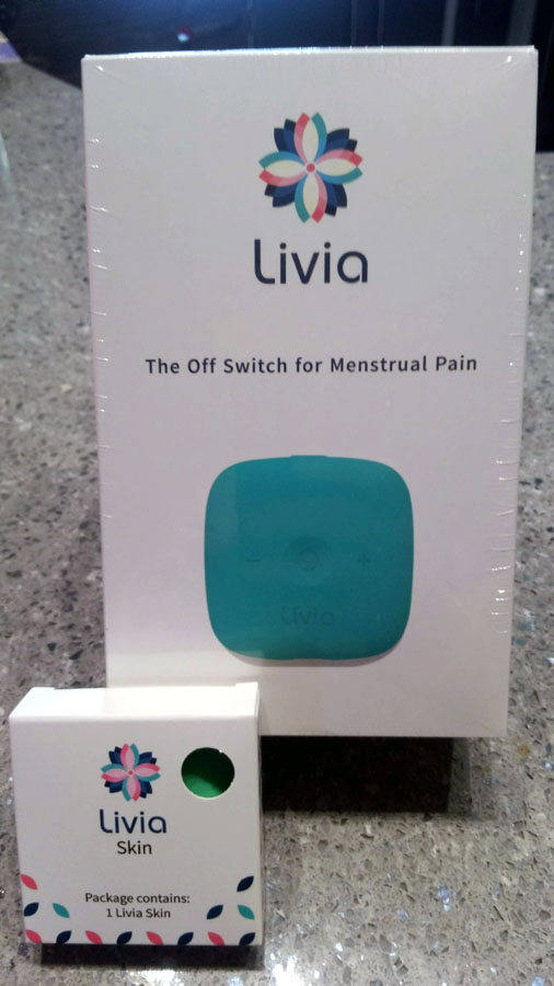 Boxed Livia unit for menstrual cramps