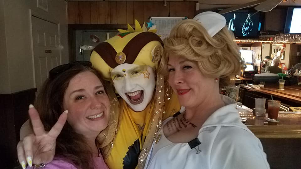 Sister Donatella Soul and Saint Birthday Suit pose together at an Endometriosis Fundraiser at a bar