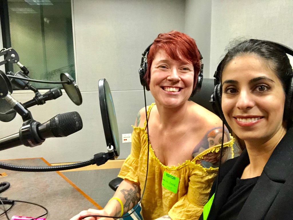 Dr. Sally Rafie and myself at the microphones