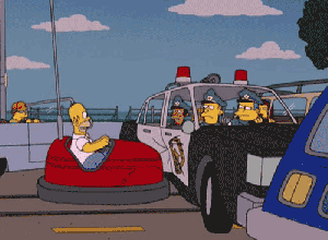 GIF of Homer Simpson in a bumper car colliding with police car