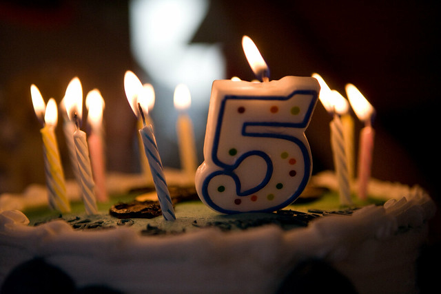 cake with a big number 5 candle on it