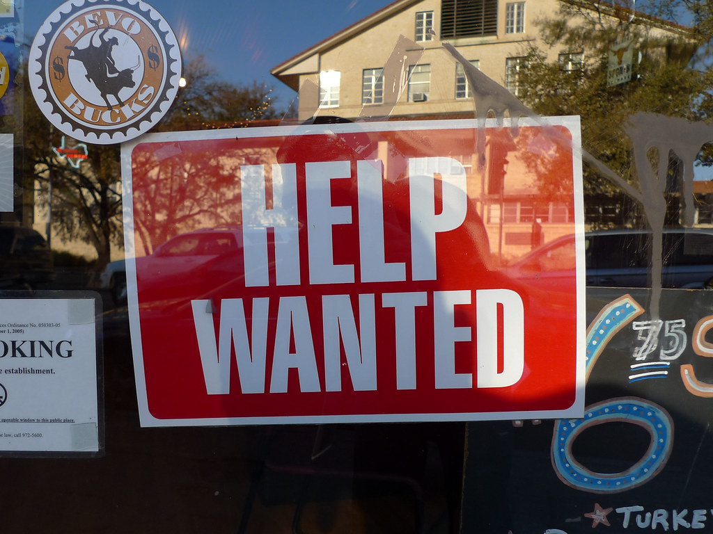 Help Wanted sign in window
