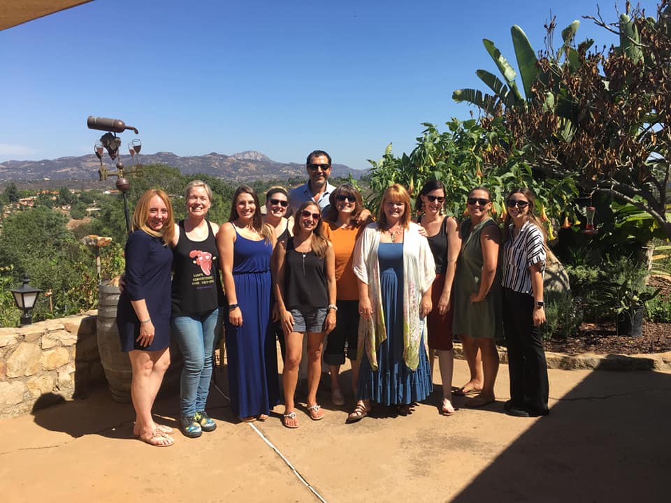 group photo overlooking winery